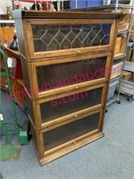 Modern 1-piece oak bookcase w/glass doors