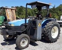 TRACTOR WITH SIDE ROTARY MOWER