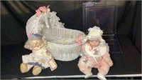 PRECIOUS MOMENTS DOLL, CRYING DOLL AND WICKER