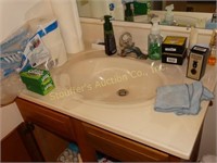 Contents of kitchen bathroom- soaps, curlers,