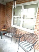 2 metal chairs, table, porch decor, wind chimes