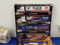 FOUR HOT WHEELS 1:64 DIE CAST TEAM TRANSPORTERS