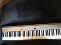 Roland FP2 digital keyboard with gig bag