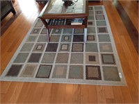 Area  Carpet. 88" X 64"