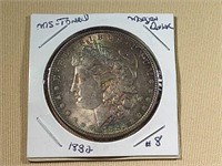 1882 MORGAN SILVER DOLLAR, TONED