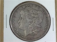 1899 MORGAN SILVER DOLLAR, RAW COIN