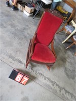 RED CUSHIONED ROCKING CHAIR