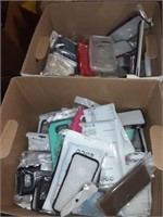 2 BOXES OF CELL PHONE COVERS