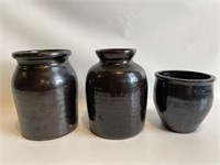 Antique glazed stoneware jars.