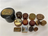 Collection of antique wooden lidded boxes.