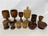 Collection of primitive wooden egg cups.