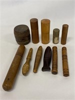 Primitive wooden needle case collection.