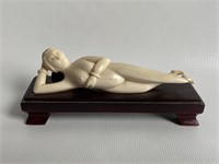 Japanese carved risqué nude woman.