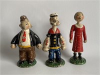 1920’s Hubley cast iron Popeye paperweights.