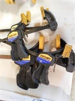 Four Quick-Grip mini bar clamps