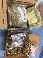 Lot of 2 boxes of brass casings including .44 mag,