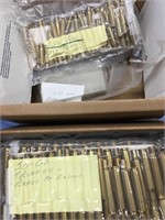 2 boxes of polished brass casings including, .222,
