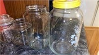 Four Large Glass Jars
