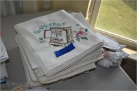 Tall Stack of Embroidered Tea Towels