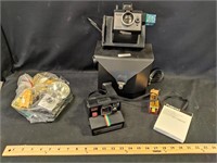 2 Polaroid Cameras and Accessories