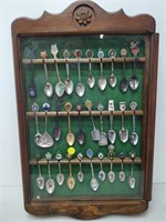 display rack with souvenir spoons 14 x 22 in