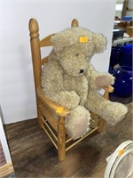 Boyd’s bear and wooden chair