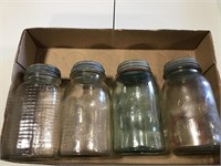 Group of 4 mason jars with zinc lids