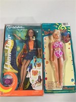 2 dolls new in package