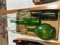 Collectible green and clear glass bottles