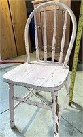 Pink chippy paint child’s chair