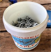 Barbed staples
