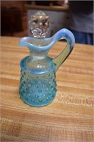 mini blue pitcher