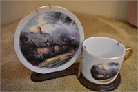 mug and saucer with house