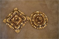 pair of gold wall hangers