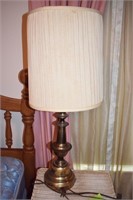 very tall brass lamp