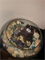 Handmade bowl with small animals and shells