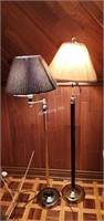 A pair of not quite matching floor lamps- A