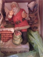 Here comes Santa figurine