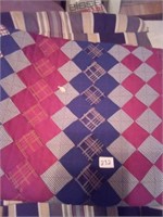 Handmade quilt has small hole