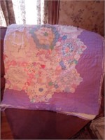 Multi color quilt:is very worn