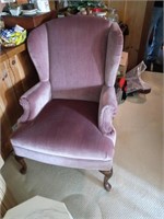 Pink wing back chair