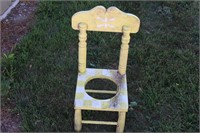 Old potty chair/ planter