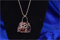 Goldtone jeweled hand bag costume necklace