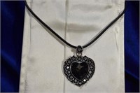Black faux leather &silvertone heart necklace