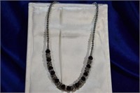 Black &silvertone adjustable costume necklace