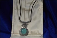 Black faux leather w/silvertone & turquoise pendet