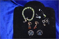 Misc bracelet earing & odd pieces of crystal