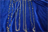 4 silvertone necklaces