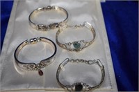 4 silvertone bracelets