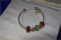 Silvertone cuff bracelet w/pandora style beads